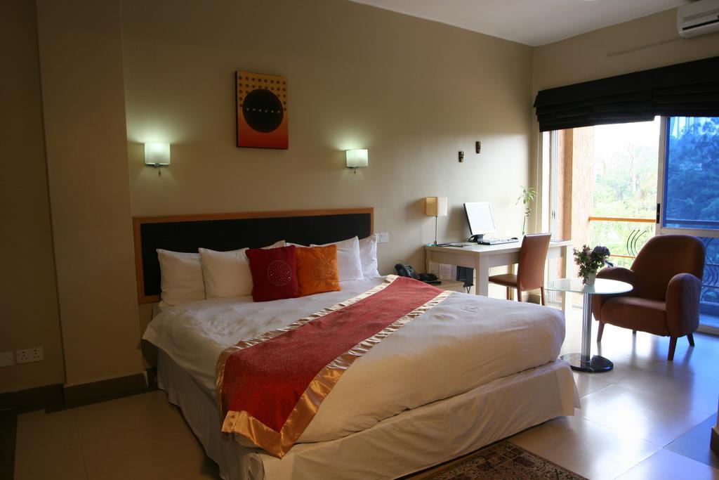 Metropole Hotel Кампала Номер фото