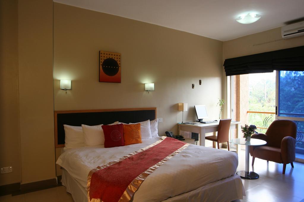 Metropole Hotel Кампала Номер фото